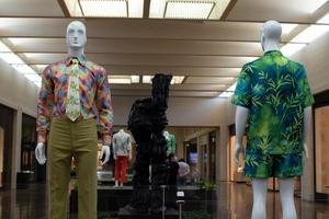 Primary view of object titled '[Menswear ensembles displayed in exhibit]'.