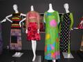 Primary view of [Four garments on display at exhibit]