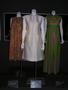 Primary view of [Three garments on display at exhibit]