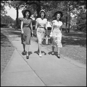 Primary view of object titled '[Lou Love, Winona Ball, and Linda Barbe Walking Outside]'.