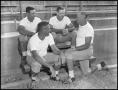 Photograph: [Football Coaches on Stairwell]