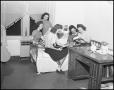 Primary view of [Helen Finnellin with friends in dorm]