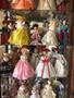Photograph: [Display case full of dolls retailed by Neiman Marcus]