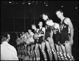 Primary view of object titled '[Basketball team at opening ceremony]'.