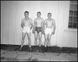 Photograph: [Three Men Wearing Shorts and High-Tops]
