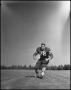 Primary view of [Football Player Number 72 on the Football Field]