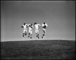 Primary view of object titled '[UNT Players Jumping]'.