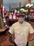 Photograph: [Man Wearing Face Mask at Casino]