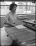 Primary view of [Woman working in the print shop]