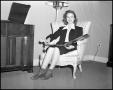 Thumbnail image of item number 1 in: '[Billie Wolfe Sitting in a Chair]'.
