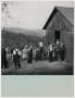 Photograph: [Children Gathered Outside of a One-room School]