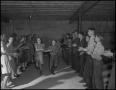 Photograph: [Boys and girls at a dance]