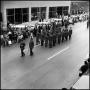 Photograph: [AFROTC members march in the Homcoming Parade November 5, 1966]