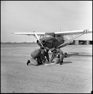 Primary view of object titled '[AFROTC members at airfield]'.