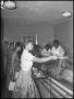 Photograph: [Students in Cafeteria at Music Clinic]