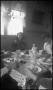 Photograph: [Aunt Esther at the Kitchen Table]