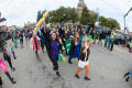 Photograph: [People walking in UNT homecoming parade]