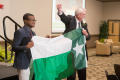 Primary view of [V. Lane Rawlins with UNT flag]