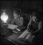 Primary view of [Doing homework by lamplight(1)]