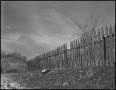 Primary view of [A wooden picket fence]
