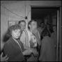 Photograph: [Photograph of a group of people in a hallway]