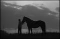 Photograph: [A man and a horse on a hill, 3]