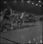 Photograph: [Basketball players falling]
