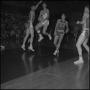 Photograph: [NT basketball player jumping with the ball]