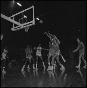 Primary view of object titled '[Basketball Game in the Coliseum Eagles against Tulsa]'.