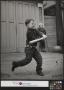 Thumbnail image of item number 1 in: '[Junebug Clark Playing Baseball in an Alley]'.