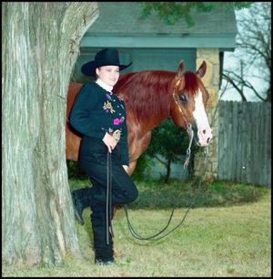 Primary view of object titled '[Photo of a Cowgirl with a Horse]'.