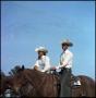 Photograph: [Benny and Di Gill on horseback]