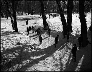 Primary view of object titled '[Children ice skating on a frozen creek]'.