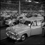 Photograph: [Automobiles in a factory, 8]