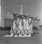 Photograph: [Six cheerleaders in front of the Hurley Administration Building, 2]