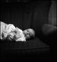 Photograph: [Baby Junebug on a chair]