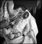 Photograph: [Baby Junebug sleeping in a blanket, 7]