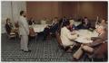 Photograph: [Herman Totten briefing the SLIS board of advisors]