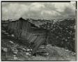 Photograph: [Photograph of dilapidated wooden structure]