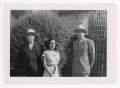 Photograph: [Macario Cuellar, Mary Cuellar, and Frank Cuellar Sr. standing in fro…