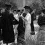 Photograph: [Graduates lined up outside for commencement]