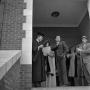 Photograph: [North Texas State University graduate in a doorway]