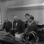 Photograph: [Four males conducting research in the Chemistry lab]