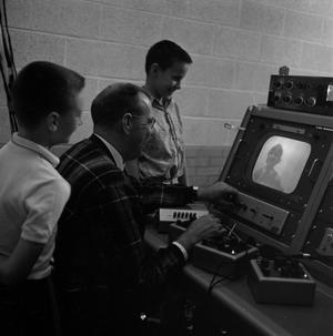 Primary view of object titled '[Children on closed circuit television 1962]'.