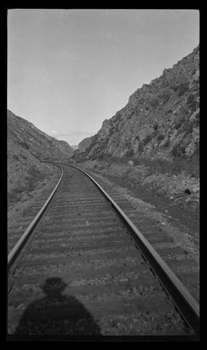 Primary view of object titled '[Train tracks running through mountains]'.