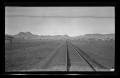 Photograph: [A railroad and a desert town]