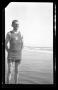 Photograph: [Byrd Williams, Jr. in his bathing suit on the beach]