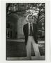 Primary view of [Larry McMurtry in Front of the Auditorium Building]