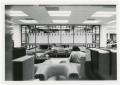 Photograph: [Students sitting in library and studying]