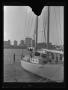 Photograph: [A sailboat in a harbor]
